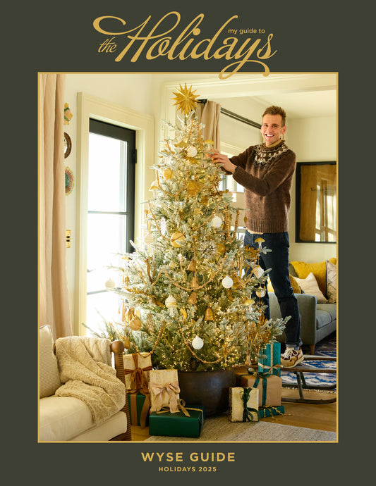 Kaleb Wyse on cover of Wyse Guide magazine with gold tree.